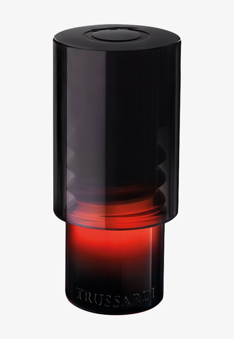 Flacon de parfum cylindrique noir et rouge brillant avec un bouchon translucide, portant le nom de la marque "TRUSSARDI" embossé à la base.
