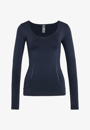 Navy blue long-sleeve fitted women's top with scoop neckline and subtle seam detailing along the sides.