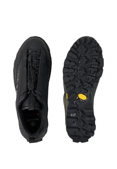 Black waterproof hiking shoes with zipper closure, brand logo on side, and rugged Vibram rubber soles shown from top and bottom views.