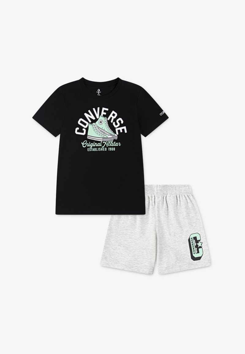 Black cotton t-shirt with white and mint graphic text "CONVERSE" and sneaker design. Grey shorts with elastic waist and mint "C" logo detail.