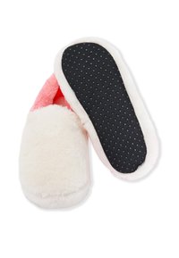 Pantofole morbide rosa e bianche, una con la parte superiore soffice e l'altra con la suola nera antiscivolo a pois.
