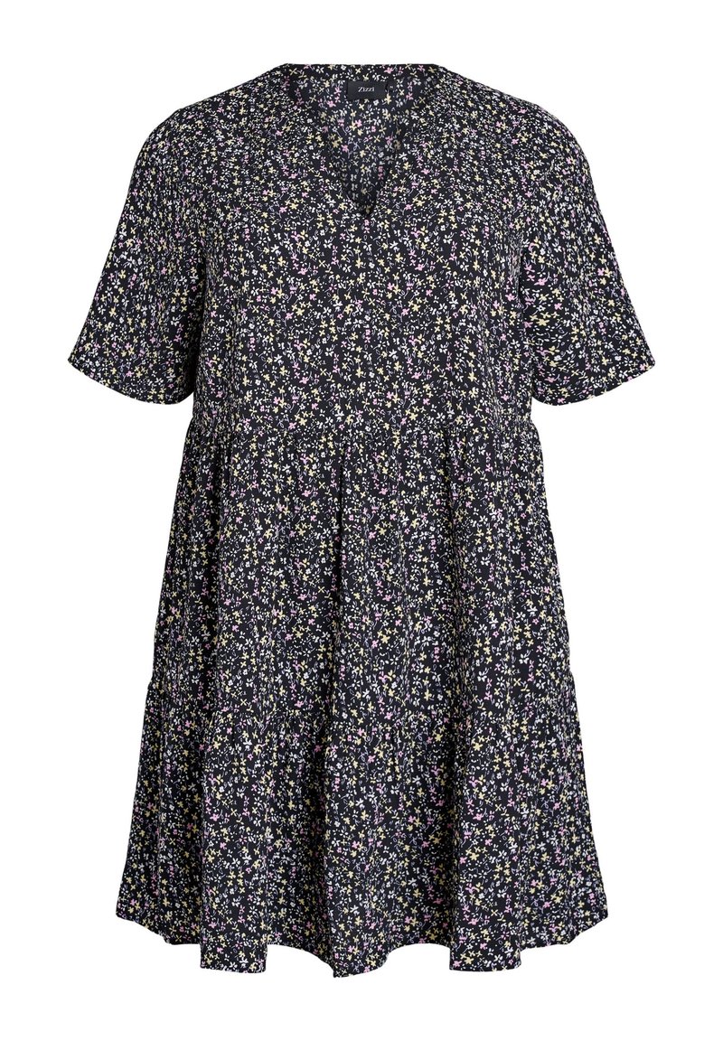 Kleita ar īsām piedurknēm jūras zila krāsā ar ziedu apdruku, ar V-veida uzgriezumu, vaļīgu piegriezumu un pakāpenisku dizainu. Izgatavota no mīksta, viegla auduma.