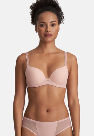 Light pink bra with padded cups, adjustable straps, a smooth texture, and a subtle center triangle detail. No additional patterns or hardware.