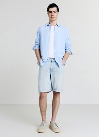 Calliope SLAVATO - Shorts di jeans - blu denim slavato