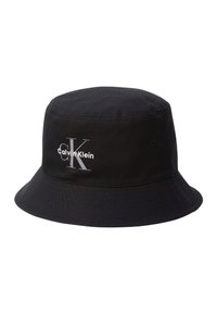 Black bucket hat with embroidered white "Calvin Klein" logo and large "CK" letters on the front.