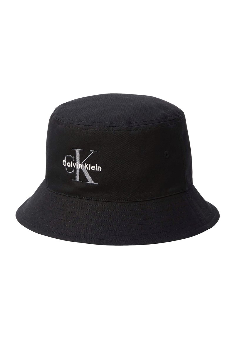 Black bucket hat with embroidered white "Calvin Klein" logo and large "CK" letters on the front.