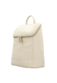Cream leather backpack with a zippered top, smooth texture, rounded handle, and minimalist design. Subtle branding on the front.