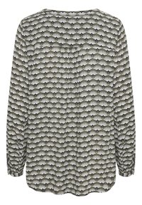 Langärmlige Bluse in olivgrün mit einem weißen Fächer-Muster. Mit einem runden Ausschnitt und gerafften Ärmelbündchen. Weiche Stofftextur.