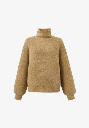 Pull à col roulé beige en maille douce et texturée. Doté de manches larges et surdimensionnées ainsi que d'un col haut pour plus de chaleur et de confort.