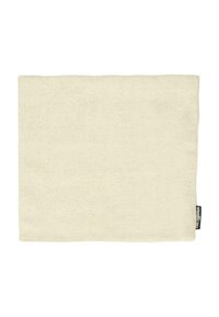 Mantel rectangular de algodón, color crema con una superficie texturizada, que presenta una pequeña etiqueta negra en un lado.