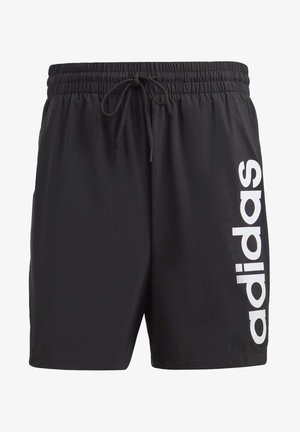 Czarne szorty sportowe z elastyczną talią i sznurkiem, z dużym białym pionowym logo „adidas” na lewej nodze.