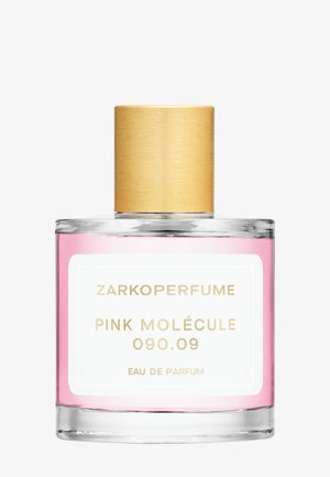 Flacon de parfum en verre transparent avec liquide rose, bouchon doré et étiquette portant la mention Zarkoperfume Pink Molécule 090.09 Eau de Parfum.