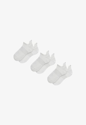 Chaussettes blanches à la cheville, présentant une texture côtelée et une bordure élastique, disposées par paires avec un design de orteil sans couture. Matériau doux.