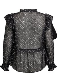 Sort gennemsigtig bluse med sølvprikket mønster, flæser på skuldrene, knappede manchetter og samlet talje. Tekstureret letvægtsstof.
