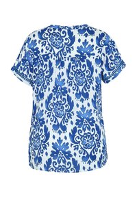 Korte mouwen blouse in wit met blauw bloemenpatroon. Lichtgewicht stof, ronde halslijn, plooidetail aan de achterkant en mouwen met manchetten.