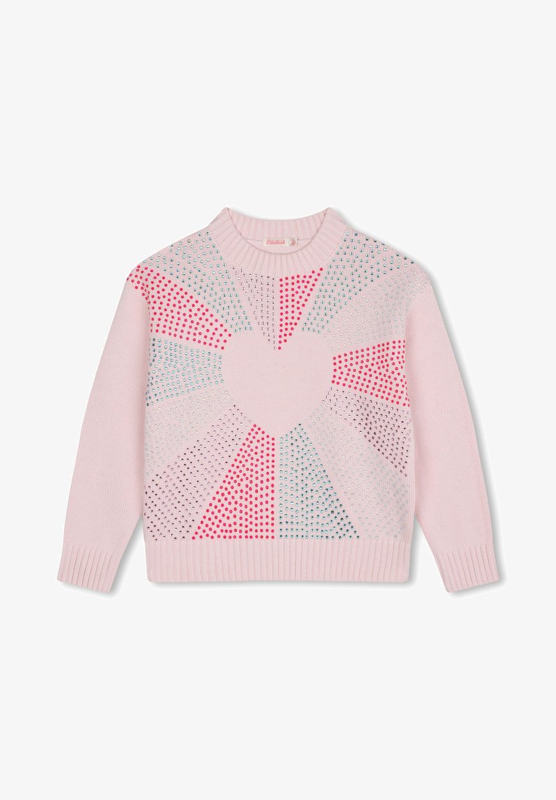 Rosa strikket genser med et hjerte-design i sentrum, med flerfargede prikkete mønstre i rødt, blått og sølv. Ribbestrikkede mansjetter.