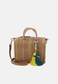 Kassi käsittelemättömästä oljesta, jossa on moniväriset langat, yläkäsikahvat ja irrotettava olkahihna. Huomattavat tupsuakcentit vihreinä ja keltaisina.