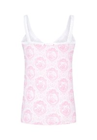 Rosa gemusterte Spaghettiträgerbluse mit weißen Rüschen-Trägern, die ein florales Design in ovalen Rahmen auf einem hellen Hintergrund zeigt. Weicher Stofftextur.