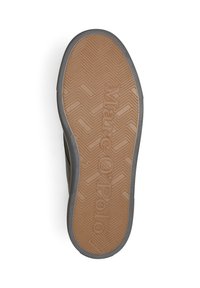 Semelle de chaussure avec un motif de bande de zigzag, marque "Marc O'Polo", taille 42, et texte "Fabriqué au Portugal".