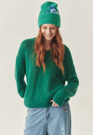 - Sweter