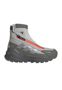 Gray and white waterproof hiking boot with orange zipper, high ankle design, textured outsole, and branding on the side and heel.