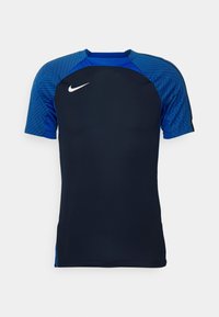 Marinblå atletisk tröja med korta ärmar i blått mönster, rundad halsringning, Nike-logotyp i vitt framtill, elegant design och slät textur.