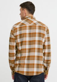 Braun-weißer Karo-Flanellhemd, langärmelig, mit geknöpften Manschetten und abgerundetem Saum. Baumwollgemisch mit einer weichen Textur.