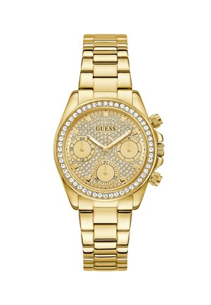Montre-bracelet Guess ton or avec lunette et cadran ornés de cristaux, trois sous-cadrans et bracelet en métal à maillons.