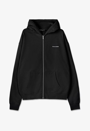 Schwarzer Kapuzenpullover mit Reißverschluss aus Baumwolle mit weicher Textur. Verfügt über eine Vorderfach, gerippte Bündchen und ein Logo auf der linken Brust.