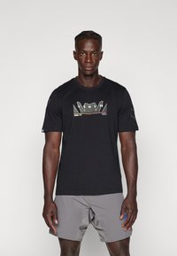 Venum SNAKE PRINT - T-shirt con stampa - black