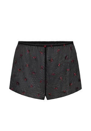Black boxers made of sheer fabric, featuring small red floral embroidery, elastic waistband, and a button closure at the front.