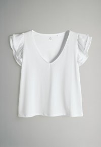 Biele bavlnené tričko s véčkovým výstrihom a volánikovými krátkymi rukávmi. Hladká textúra, voľný strih, bez vzorov a ozdôb.