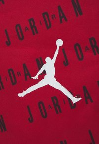 Jordan JAN CORE GYM SACK UNISEX - Stiprinājuma auklu aizdares sporta soma - gym red