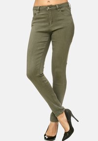 Elara STRETCH - Vaqueros pitillo - grün