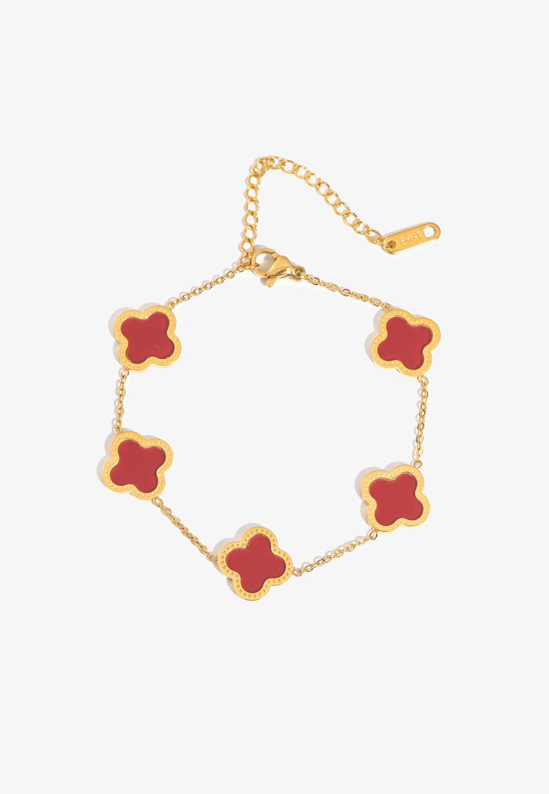 Gold chain bracelet with five red enamel four-leaf clover charms and a lobster clasp with adjustable link chain.