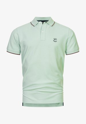Light green short-sleeve polo shirt with a collar, featuring a small logo on the left chest and contrasting dark trim on collar and sleeves.