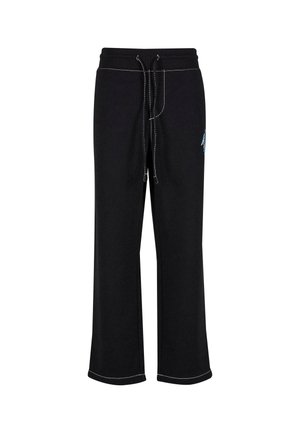 Pantaloni sportivi neri in cotone con vestibilità ampia, dotati di vita regolabile con coulisse e cuciture a contrasto bianche. Nessun motivo o accentuazione.
