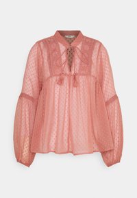 Pfirsichrosa Bluse aus durchscheinendem, strukturiertem Stoff, mit einer Schleifenbefestigung am Hals, besticktem Yoke und Ballonärmeln mit elastischen Bündchen.