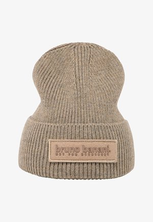 Beige knitted beanie hat with a ribbed texture, featuring a rectangular leather label with embossed text on the front.