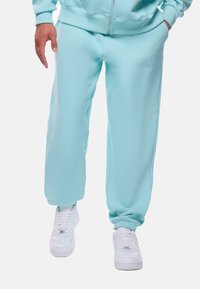 Dropsize LOOSE FIT  - Pantalones deportivos - turquoise