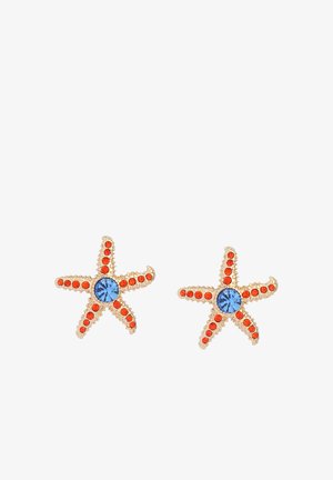 Boucles d'oreilles en or en forme d'étoile de mer avec des pierres centrales bleues et de petites pierres précieuses rondes orange sur chaque bras.
