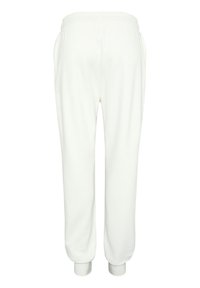 Weiße Sweatpants aus weichem Material, mit elastischem Bund, schmal zulaufenden Beinen und gerippten Bündchen am Knöchel.