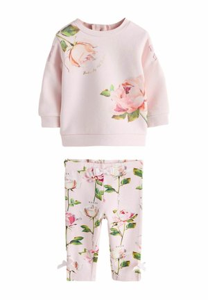 Light pink toddler sweatshirt and matching leggings with a floral pattern of roses and green leaves, featuring small bows on leggings.