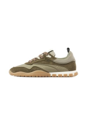 Olive green and beige low-top sneaker with suede and fabric panels, brown patterned laces, pull tab on heel, and tan rubber sole with tread.