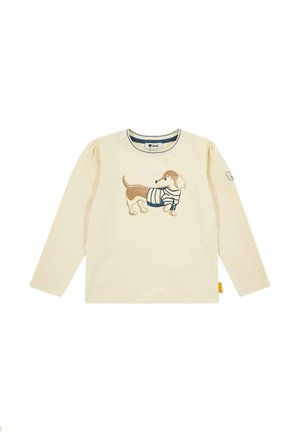 Cremefarbenes Langarmshirt mit einem Dackel in gestreiftem Pullover, mittig vorne bedruckt.
