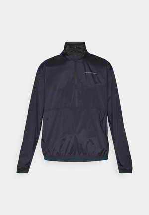 Half-zip navy jacket made of lightweight, smooth fabric. Features a mock collar, elastic cuffs, and a small logo on the chest.