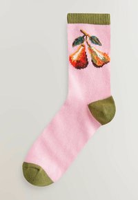 Lyserød bomuldsstrømpe med grøn ribbet kant. Har en farverig pære-grafik foran. Glat tekstur, standard crew-design.