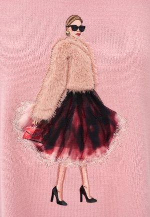 Pink sweater features an embroidered design of a figure in a fuzzy beige coat and a black, red-dyed skirt, paired with black high heels.