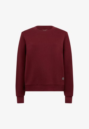 Bordeaux sweatshirt met een ronde halslijn, geribbelde mouwen en onderkant. Zachte stof met een klein logo-accent aan de onderzijde.
