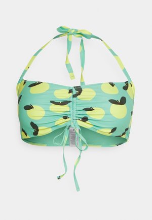 Top de bikini verde menta com um design franzido, padrão de maçãs amarelas com folhas pretas e atilhos ajustáveis no pescoço e nas costas.